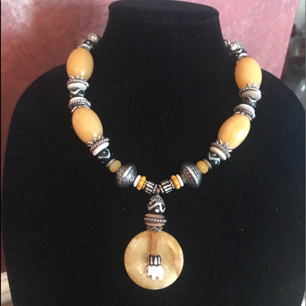 Amber/silver tone, ethnic themed necklace
